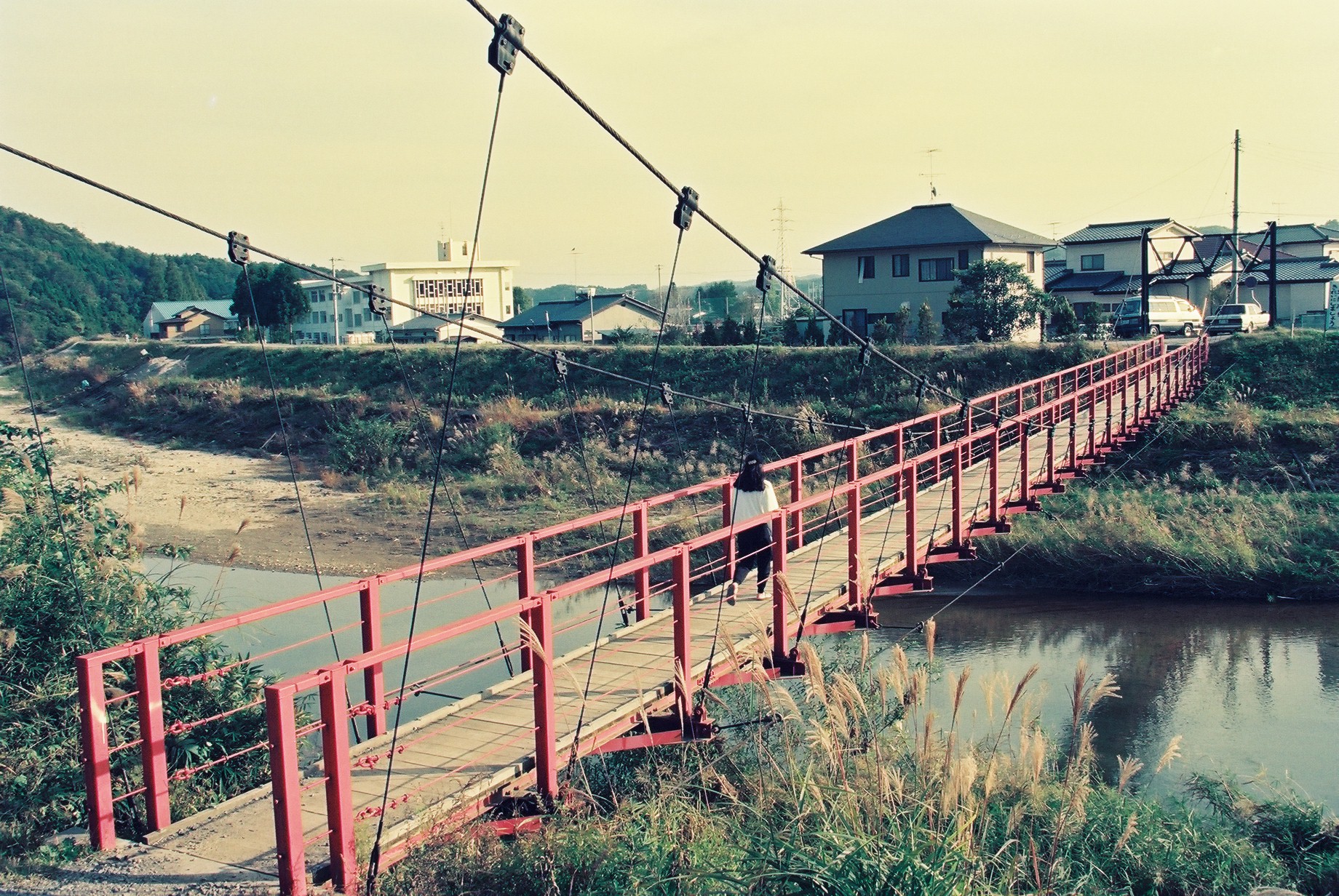 12_好間川・松坂吊り橋を北側から見る（平成５年、いわき市撮影）