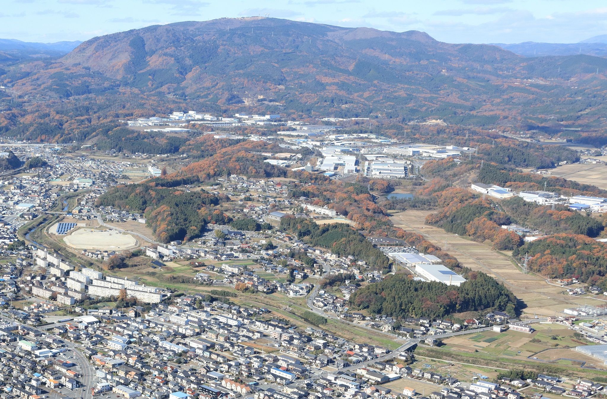 ■写真1-5　「いわき好間中核工業団地」の西隣には、「あかいテクノパーク」の工業団地が造成され工場を誘導　〔平成27年（2015)12月　いわき市撮影〕.JPG